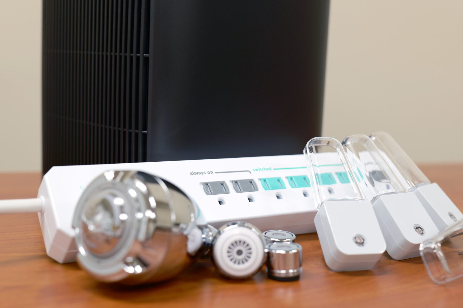 Energy Efficiency Care Package including an air purifier, power strip, shower and faucet aerators, and LED nightlights.