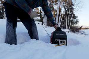 generator outside in the snow