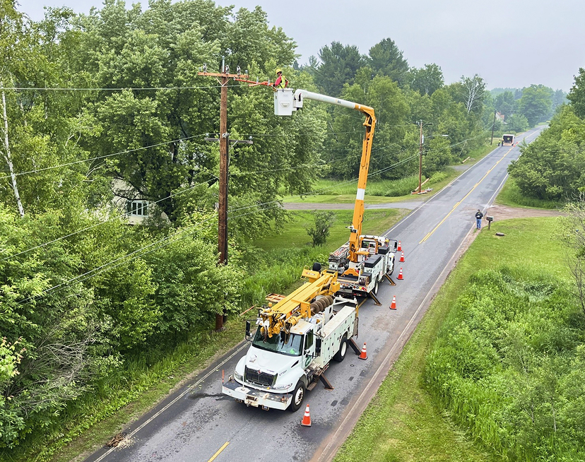 UPPCO employees and trucks making repairs